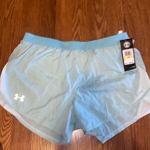 Teal under armor athletic shorts size medium. Never worn.